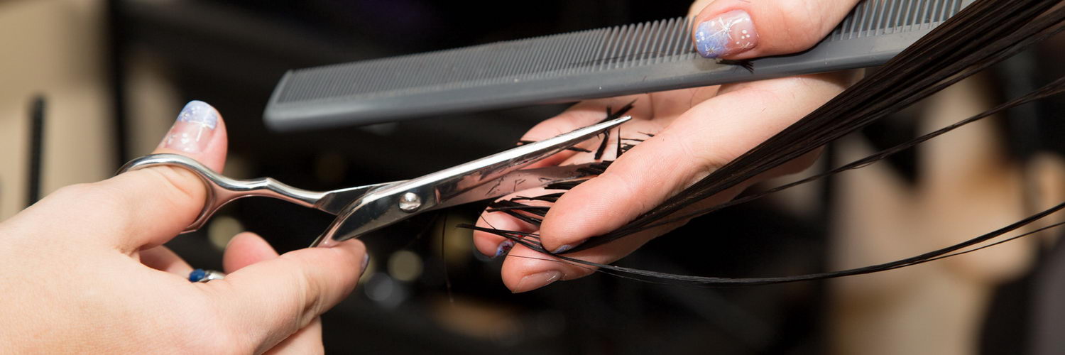 Women's haircut scissors at salon